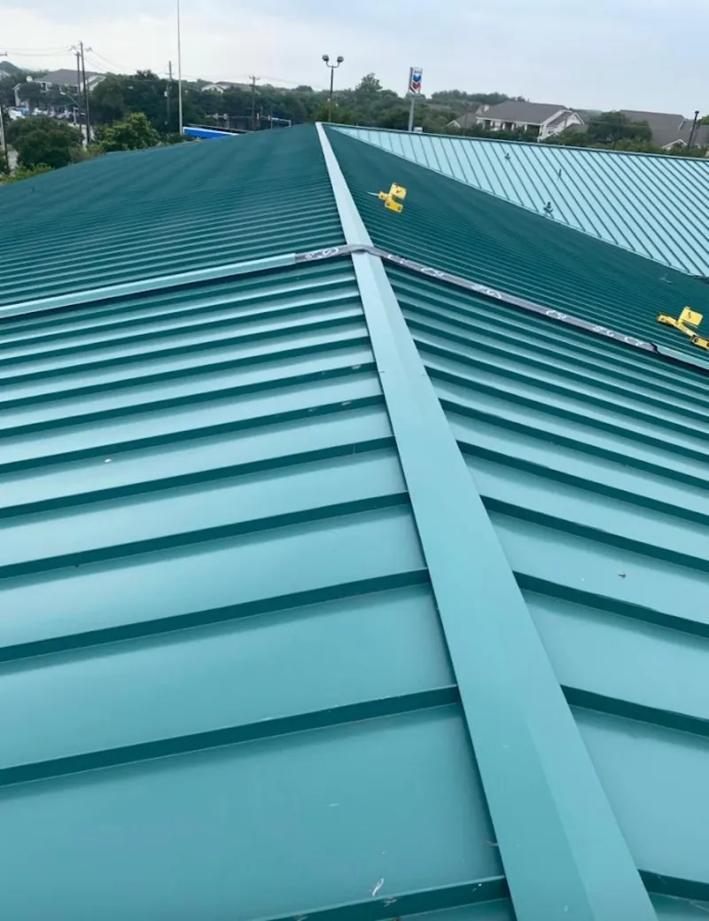 Green commercial metal roof ridge and valley for Metal Roof Repair in Polson